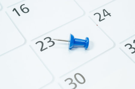 Blue pins mark the 23th on your calendar.
