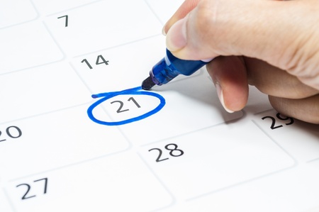 Blue circle. Mark on the calendar at 21.の写真素材