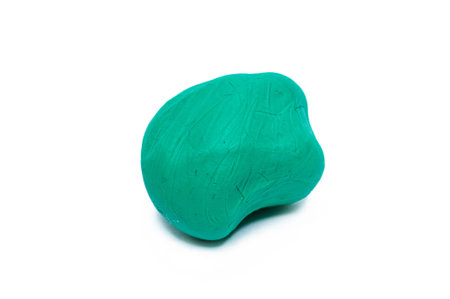 Colorful plasticine. Green on a white background.