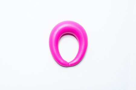 O-Plasticine alphabet color letters on a white background.