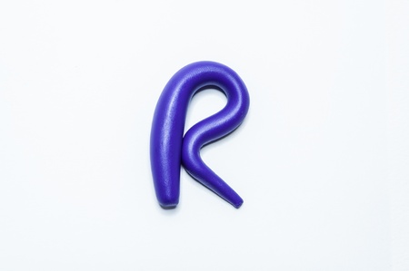 R-Plasticine alphabet color letters on a white background.の写真素材