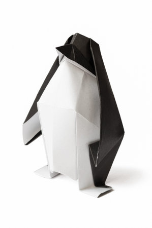 Origami penguin on a white background.の写真素材