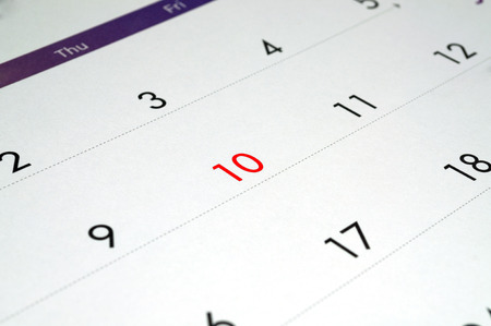 Calendars are red color at number 10. の写真素材