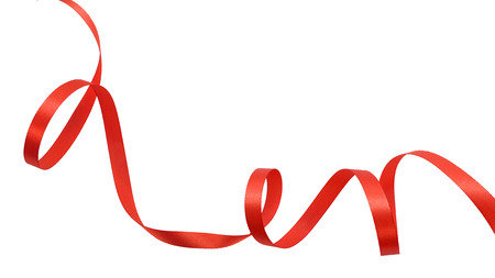 Red ribbon on a white backgroundの写真素材