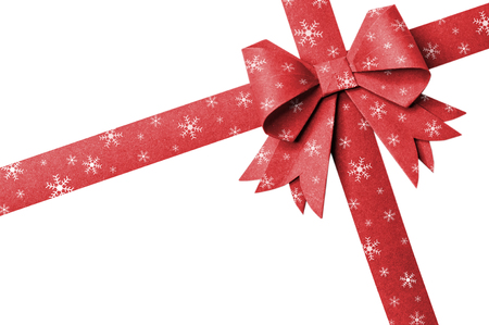 Red paper ribbon stripes snow flake on a white background.の写真素材