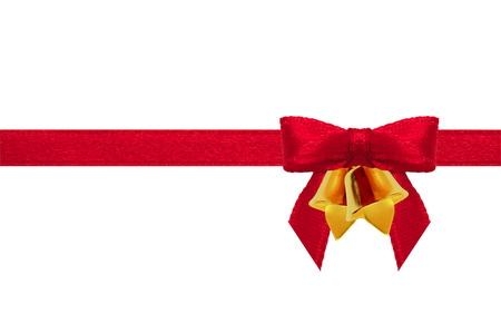 Red ribbon Bow and bell on a white backgroundの写真素材