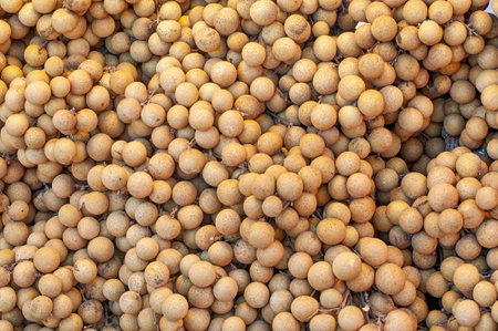 Full frame close up of exotic fruit  longan background. top view