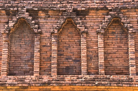  Windows pattern on striped brick  pagoda in Wat Phra That Hariphunchai Lamphunの写真素材
