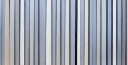Wall style pattern vertical dark and light white gray and black color made of wood. Background, wallpaper, and texture.の写真素材