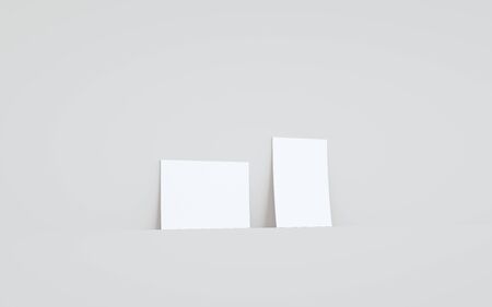 A6 Flyer / Brochure Mock-Up - Two Flyers Against Wall Background. 3D Illustrationの写真素材