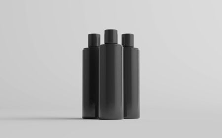250ml Black Plastic Shampoo / Shower Gel / Skin Tonic, Cosmetic Bottle Mockup - Three Bottles. 3D Illustrationの写真素材