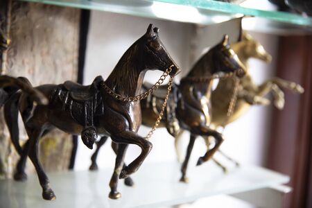 The animal statue, trinket as a decoration object on a flat backgroundの写真素材