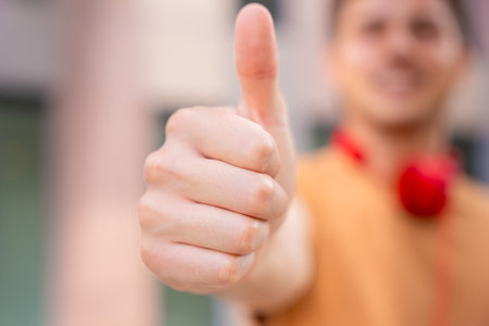 Thumbs Up Hand Gesture Showing Approvalの写真素材
