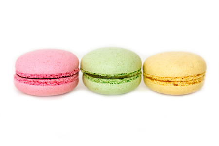 Colorful three macaroons isolated on white backgroundの写真素材