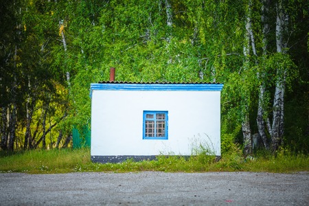 White house in forestの写真素材