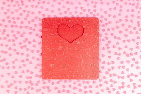 Red Valentine Card with Heart Decoration Small Hearts on a Pink Background. Concept of Celebration Valentines Dayの写真素材