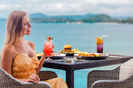 Restaurant woman drinking tropical cocktail mocktail. Asia travel vacationの写真素材