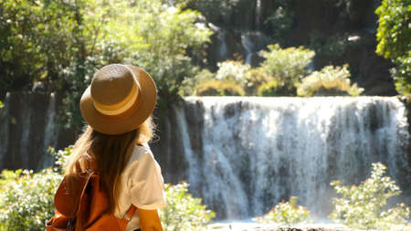 Amazing Asia journey. Happy travel woman admired and inspiring her vacation and adventure on famous...