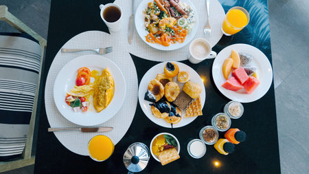 Hotel breakfast buffet with variety of food. Top view of tropical breakfastの写真素材