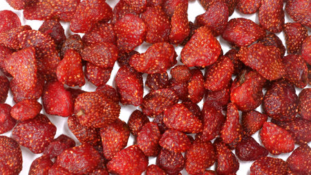 Top view of juicy, red dried strawberries in a stack.の写真素材