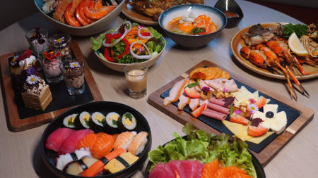Assorted selection of gourmet dishes on table inclusive of seafood,の写真素材