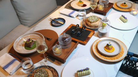 Elegant Dining Experience with Gourmet Dishes and Fine Wine onの写真素材