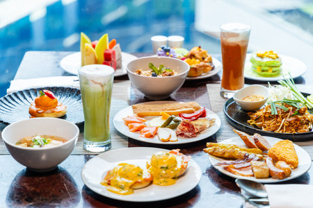 Luxurious breakfast brunch spread with variety of sweet, savory dishesの写真素材