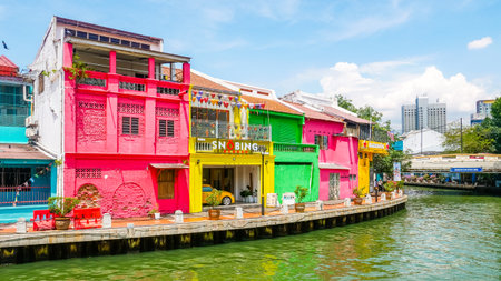 Colorful riverside shophouses with bright painted facades along theのeditorial素材