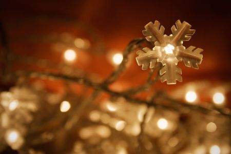 Christmas lights on dark backgroundの写真素材