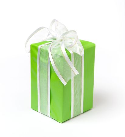 Green Christmas gift on white isolated backgroundの写真素材
