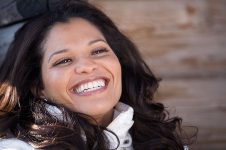 Outdoor portrait of beautiful smiling womanの写真素材
