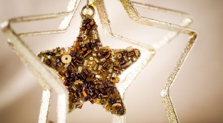 Beautiful golden Christmas star hangingの写真素材