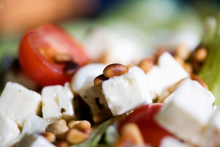 Feta salad with tomatoes and roasted pine nutsの写真素材