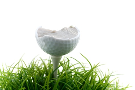 Golf ball on green grass, selective focusの写真素材