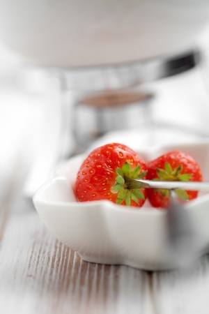 Chocolate fondue with fresh strawberries, selective focusの写真素材
