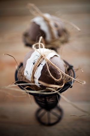 Brown easter eggs with musical notes and ribbonの写真素材