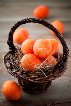 Bright orange easter eggs with selective focusの写真素材