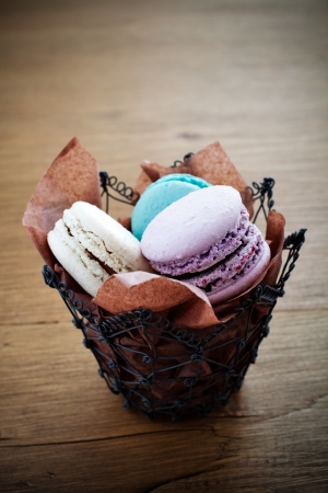 Colorful french macaroons on dark wooden backgroundの写真素材