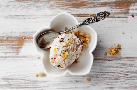 Ice cream with dried fruits and muesliの写真素材