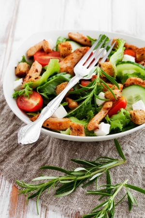 Salad with roasted chicken, tomatoes and fetaの写真素材