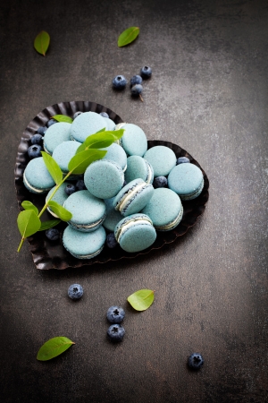 Close up of blueberry macaroons with white fillingの写真素材
