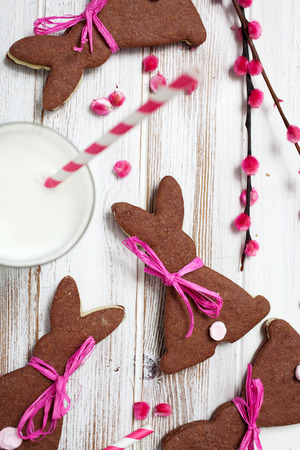 Easter chocolate cookies with glass of milkの写真素材