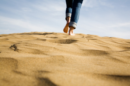 Footprints on sand, selective focusの写真素材