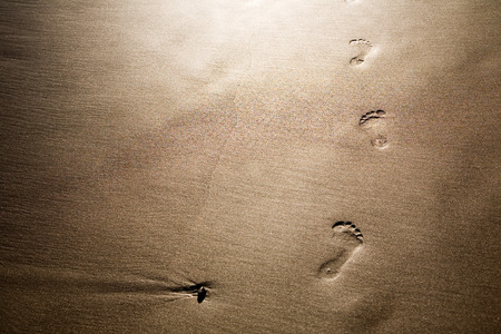 Footprints on sand, selective focusの写真素材