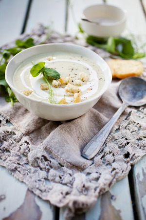 Homemade cauliflower soup with peasの写真素材