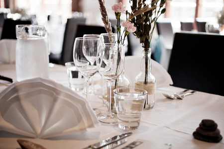 Wedding table setting with elegant white decoration