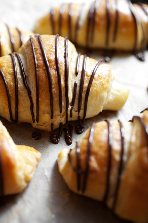 Fresh homemade croissants with chocolateの写真素材