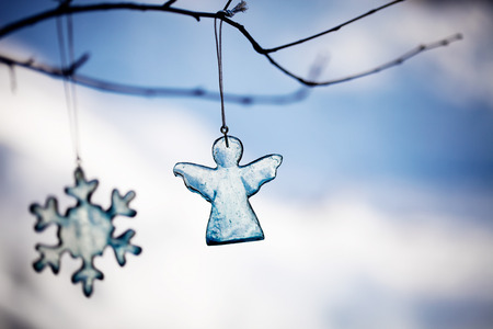 Handmade christmas decoration made from blue glassの写真素材