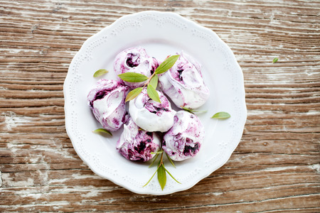 Delicious and beautiful blueberry meringuesの写真素材