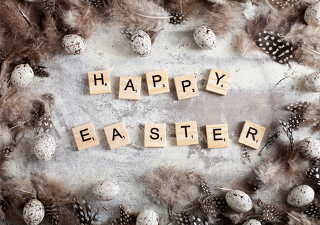Happy Easter written with wooden lettersの写真素材